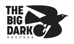 Logo for The Big Dark Records featuring a stylized black bird in flight with the company name in large bold text to the left and the word 